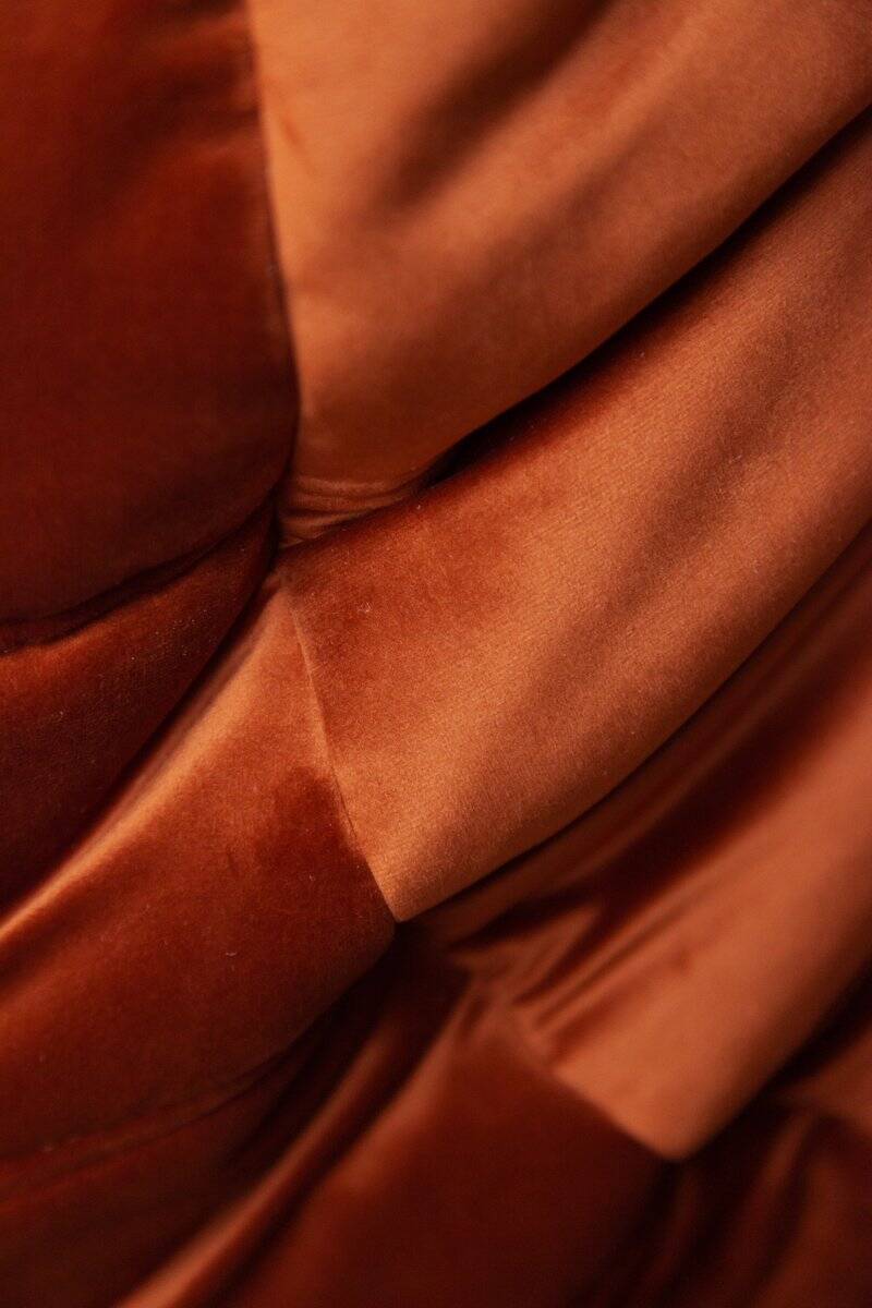 Togo two-seater sofa in amber orange velvet by Michel Ducaroy for Ligne Roset, 1973