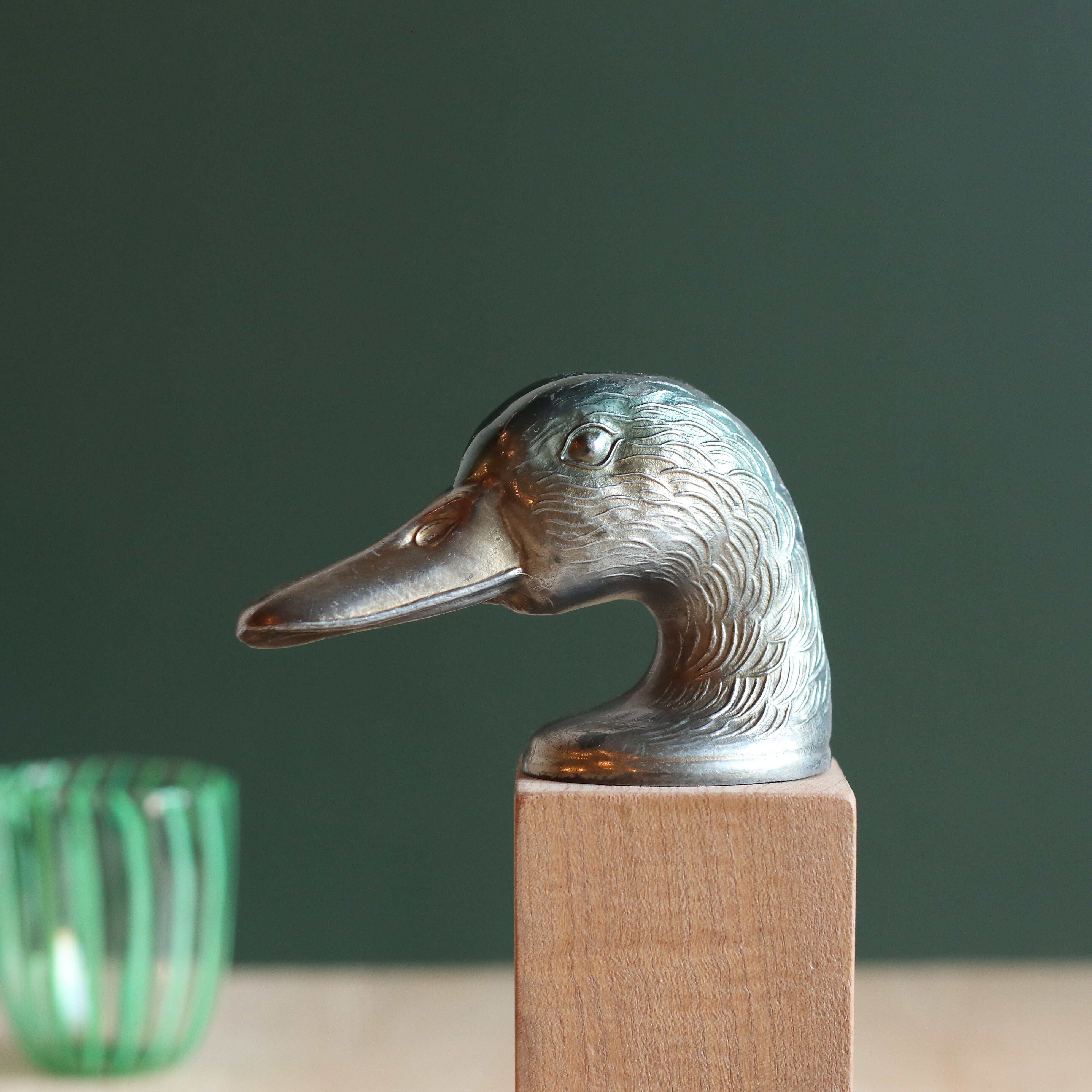 Vintage duck bottle opener signed Ducky in silver metal