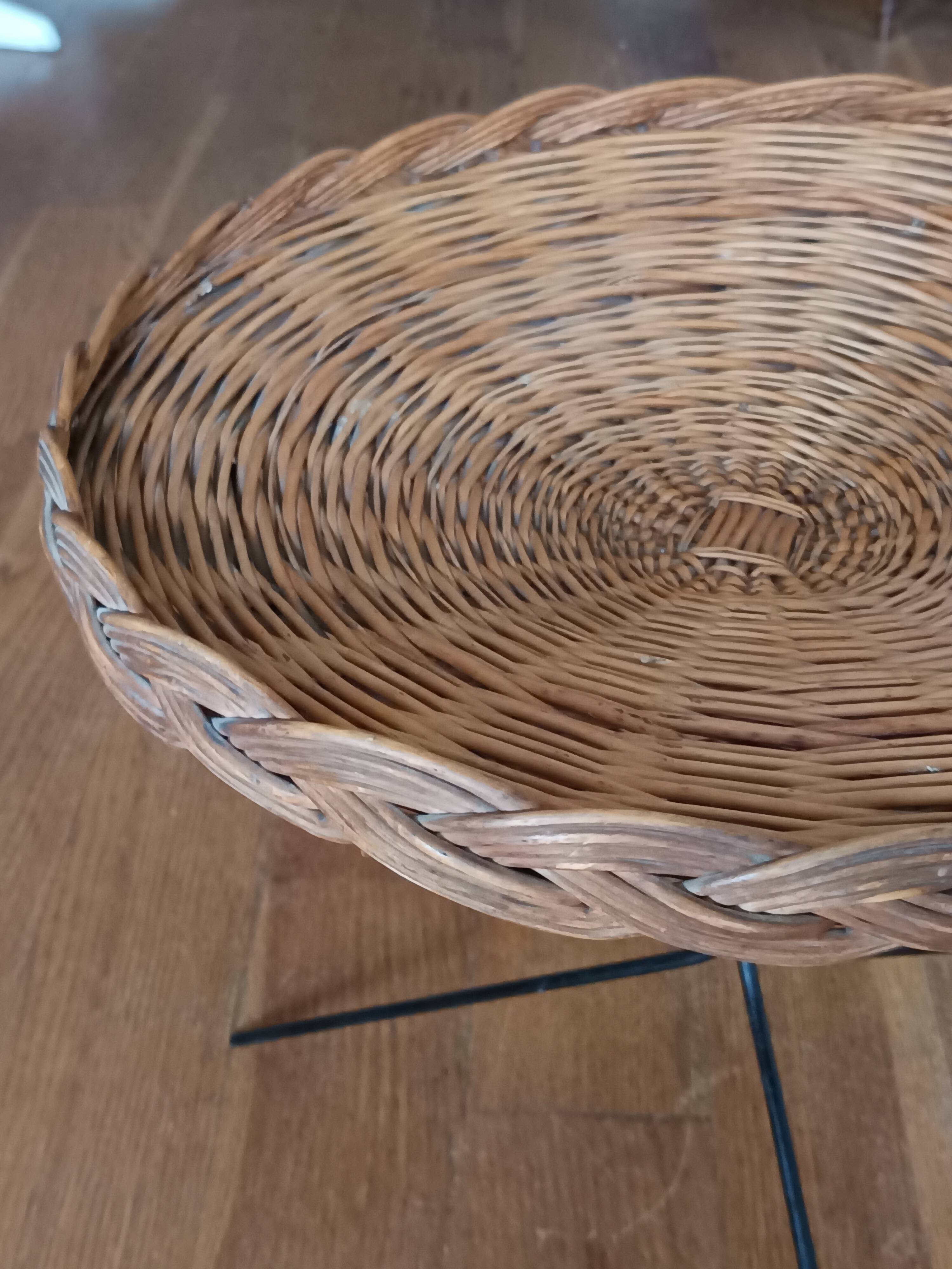 vintage wicker gueridon with a black metal tripod base from the 1960s