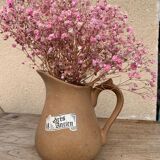 Small ancient sandstone pitcher