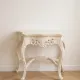 Louis XV console in carved cream white wood.