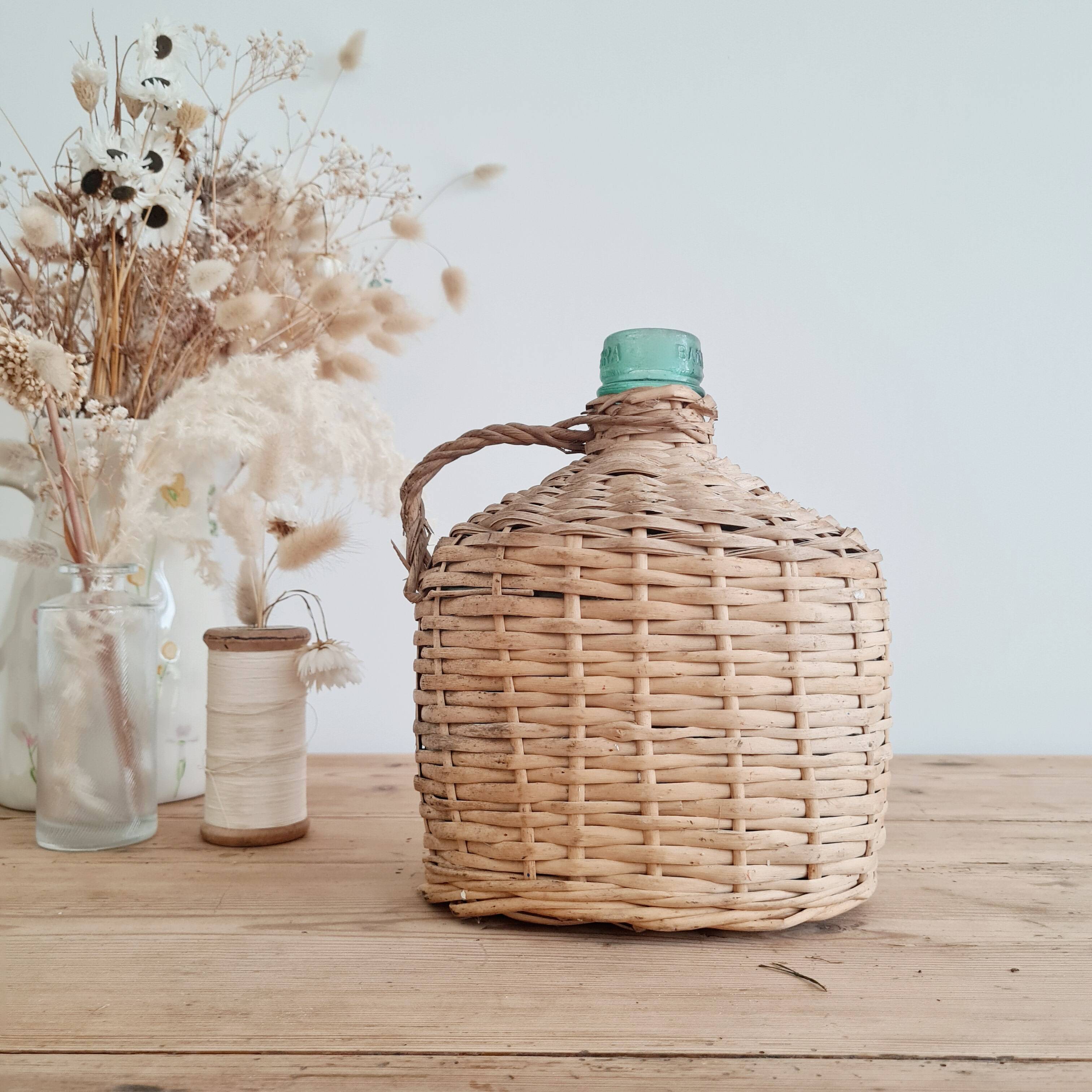 Glass and rattan demijohn carboy