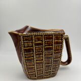 Ceramic pitcher with braided effect