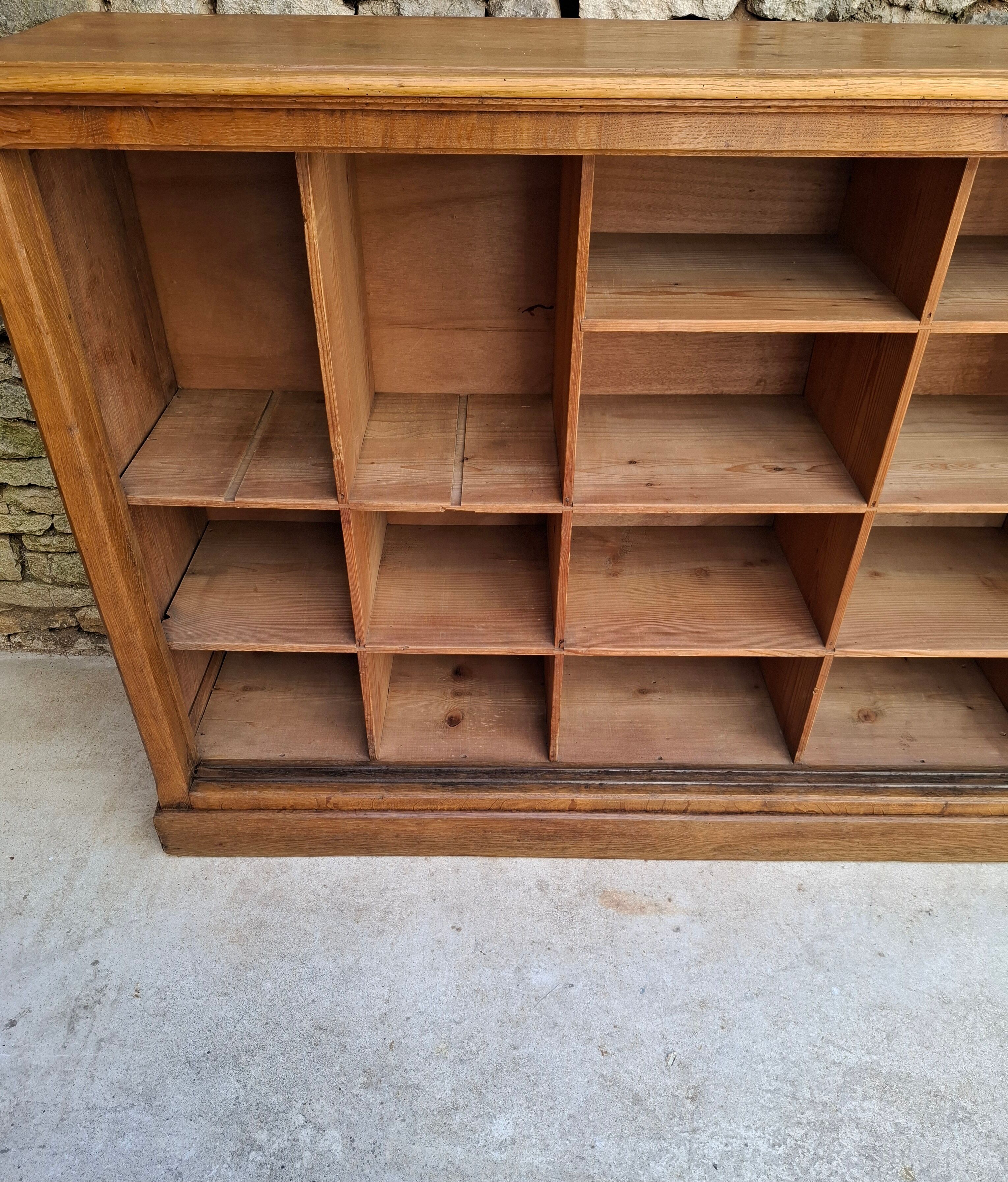 Oak workshop furniture with sliding doors.