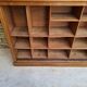 Oak workshop furniture with sliding doors.