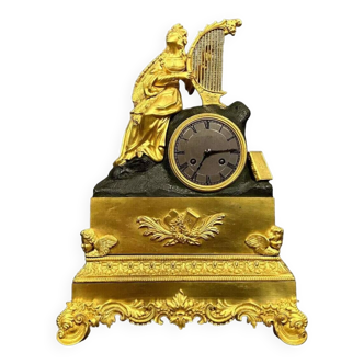 Bronze clock with double patina Empire period 19th century