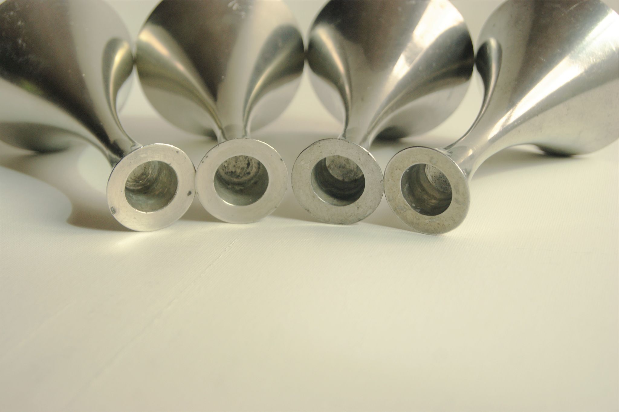 Set of 4 Art Deco candle holders by Just Andersen from the 1940s - fine elegant minimalist design.
