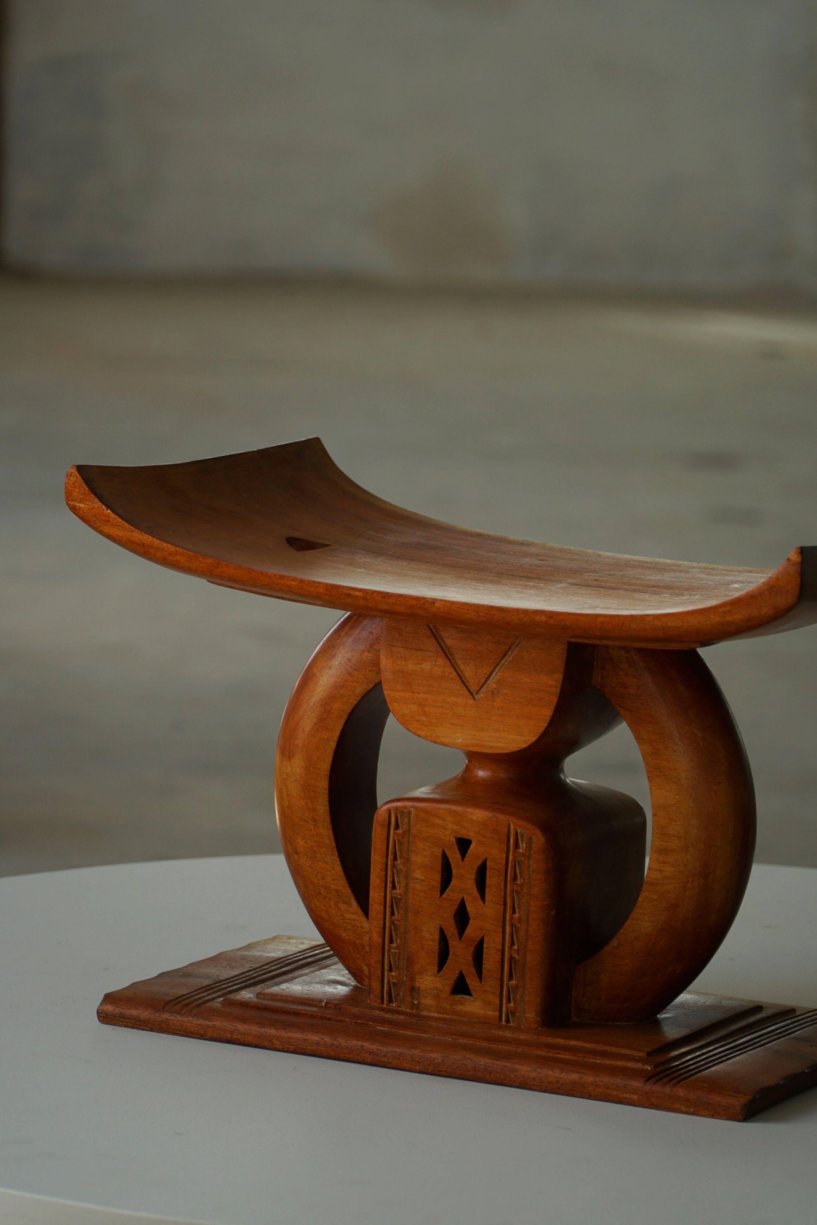 Ashanti stool from West Africa, carved from hardwood, 20th century.