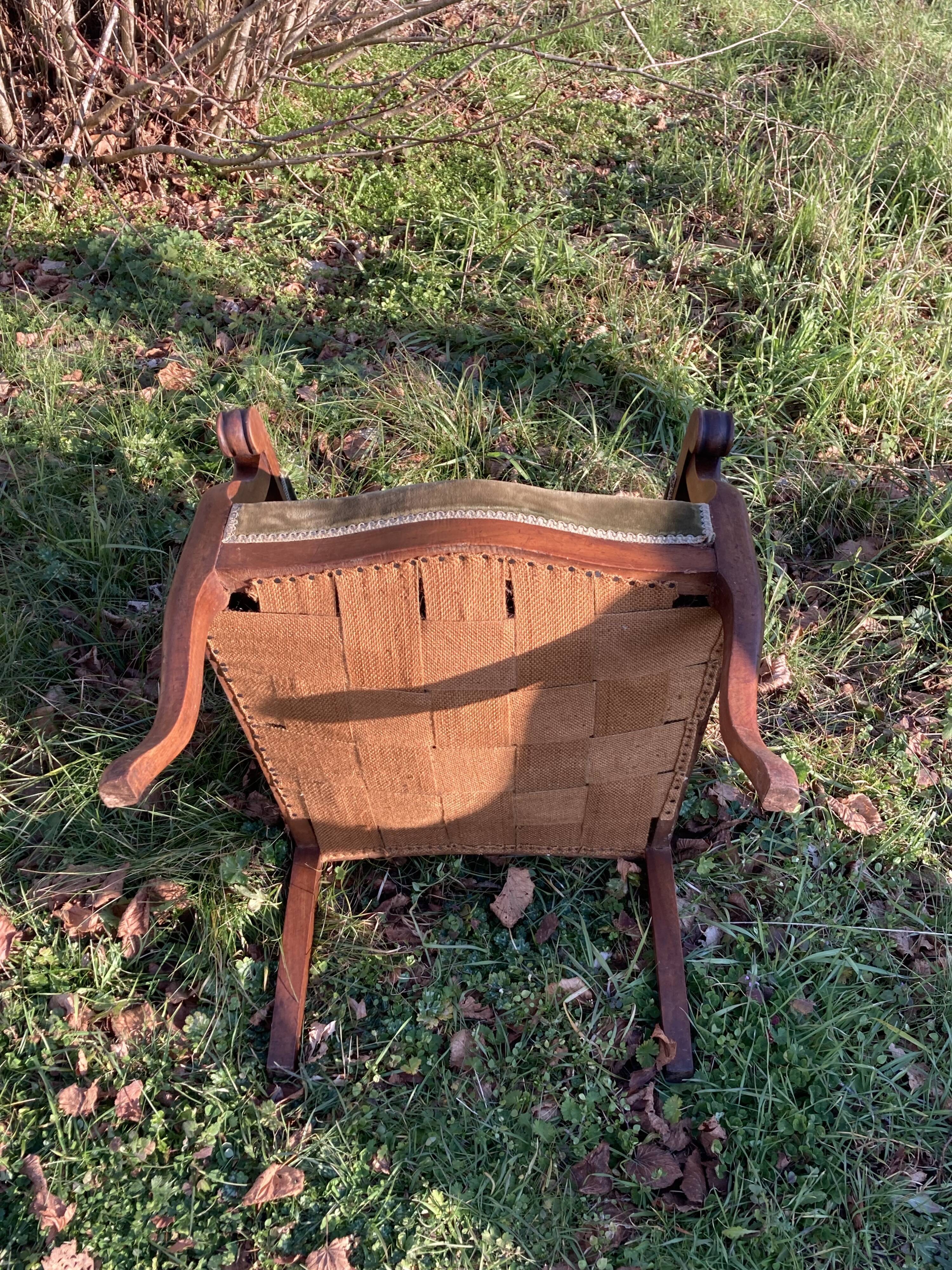 Antique Voltaire armchair in wood and green velvet Louis Philippe