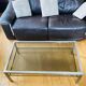 1970s coffee table in brushed metal, brass and smoked glass by Willy R