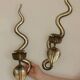 Pair of Egyptian Revival Style Engraved Brass Cobra Sconces