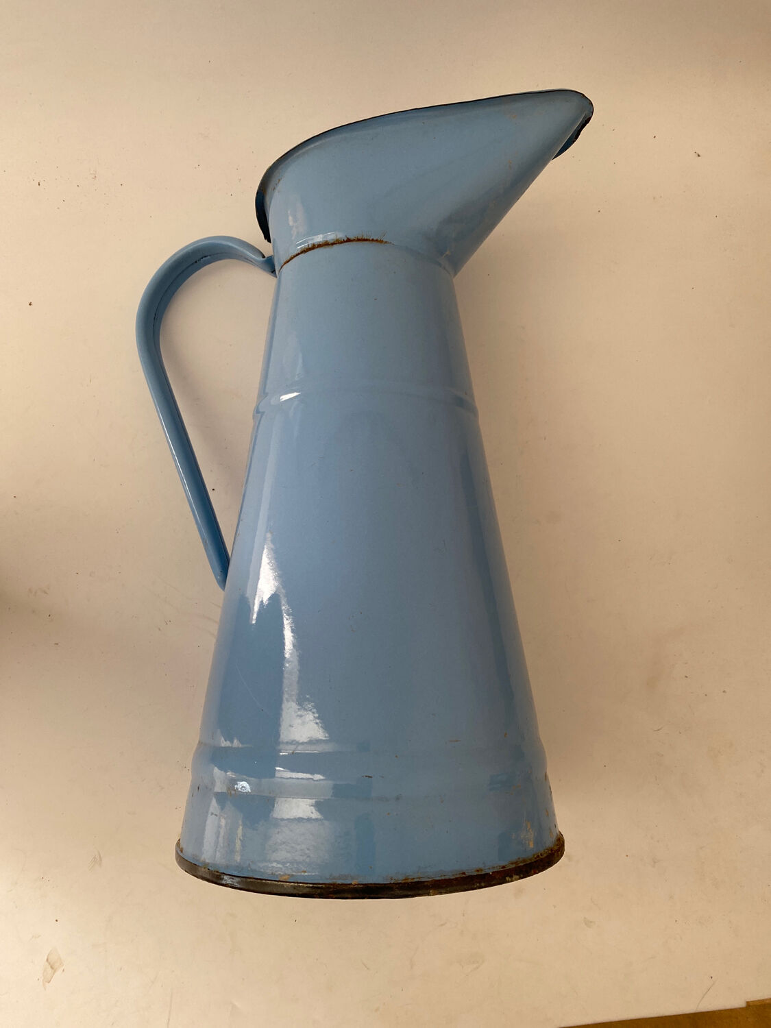 Blue watering can