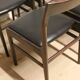 Set of 4 vintage chairs in teak and imitation leather, 1960s