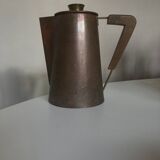 Modernist Italian pitcher design from the 1960s in patinated wood and metal.