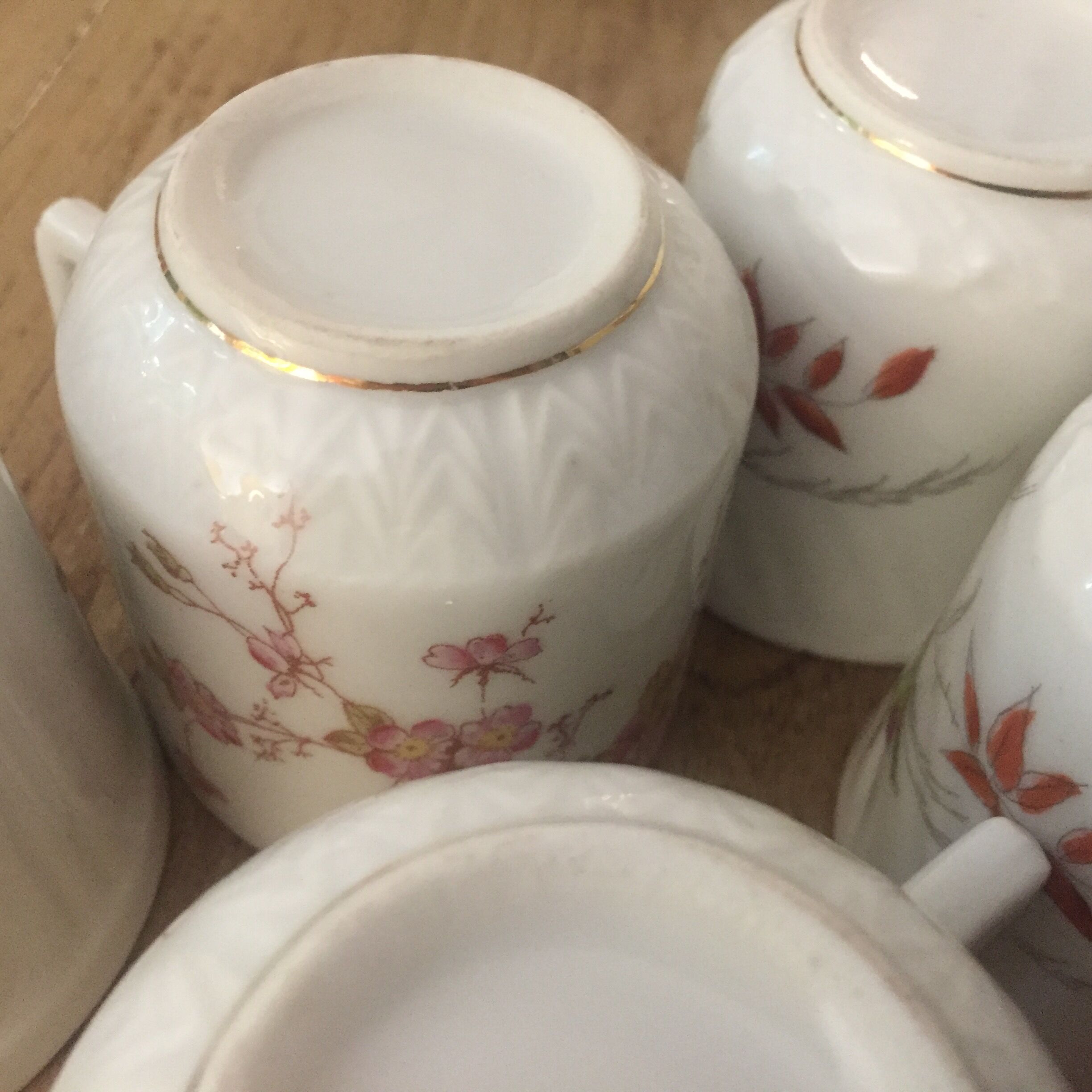 8 mismatched antique porcelain cups