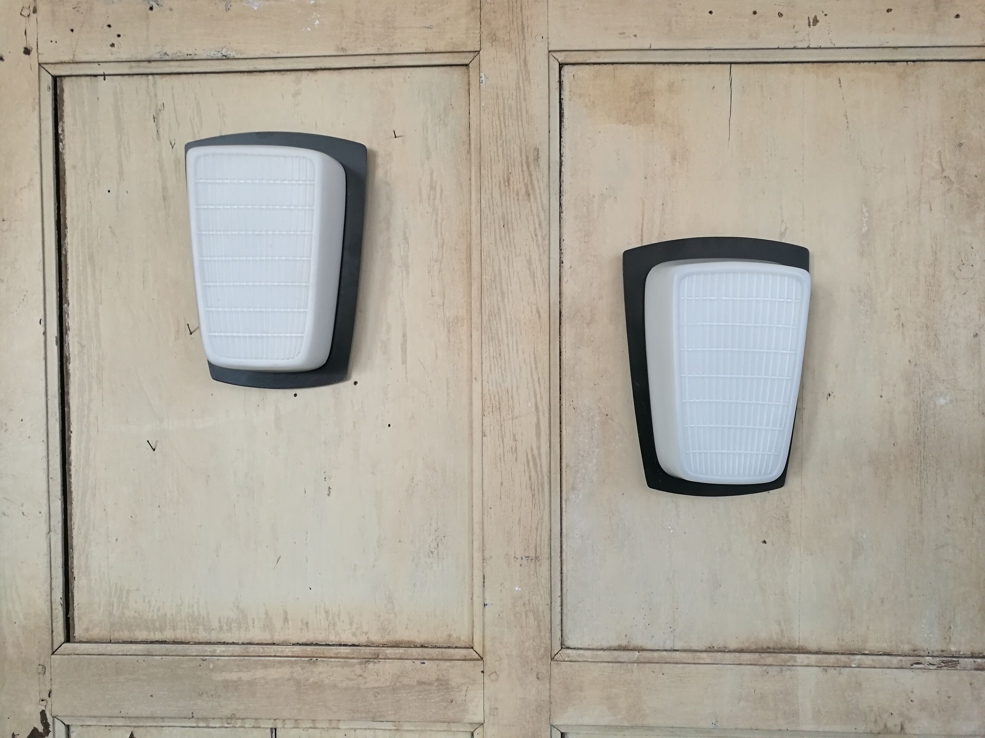 Pair of opaline and metal wall lamps
