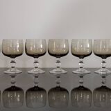 9 white wine glasses on vintage Luminarc smoked black stem