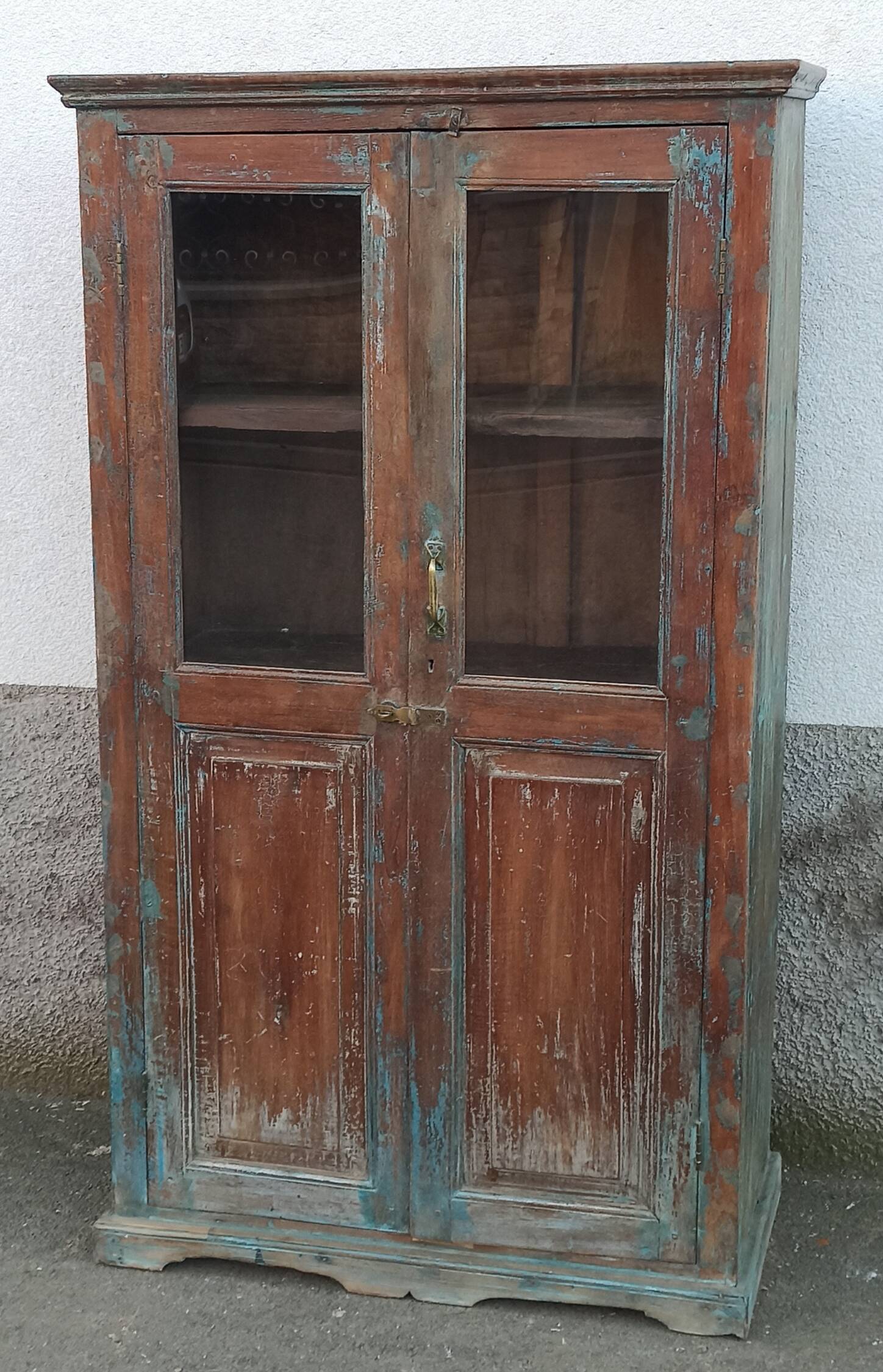 Old glazed wooden cabinet with beautiful patina