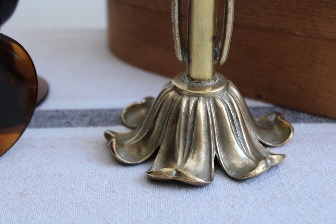Golden metal stand candle holder
