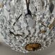 Hot air balloon chandelier with tassels and brass