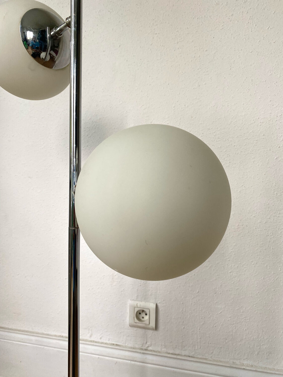 Vintage floor lamp has two opaque glass spheres