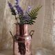 Small copper milk jug