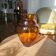 Vintage Art Deco vase in amber glass with a wavy neck - height 25 cm
