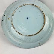 Delftware dish with blue flowers on a white background, 18th century, 35 cm