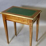Louis XVI writing table with brass beading