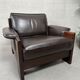 Vintage Leolux brown leather/oak lounge chair and ottoman by Harry de Groot – 1970