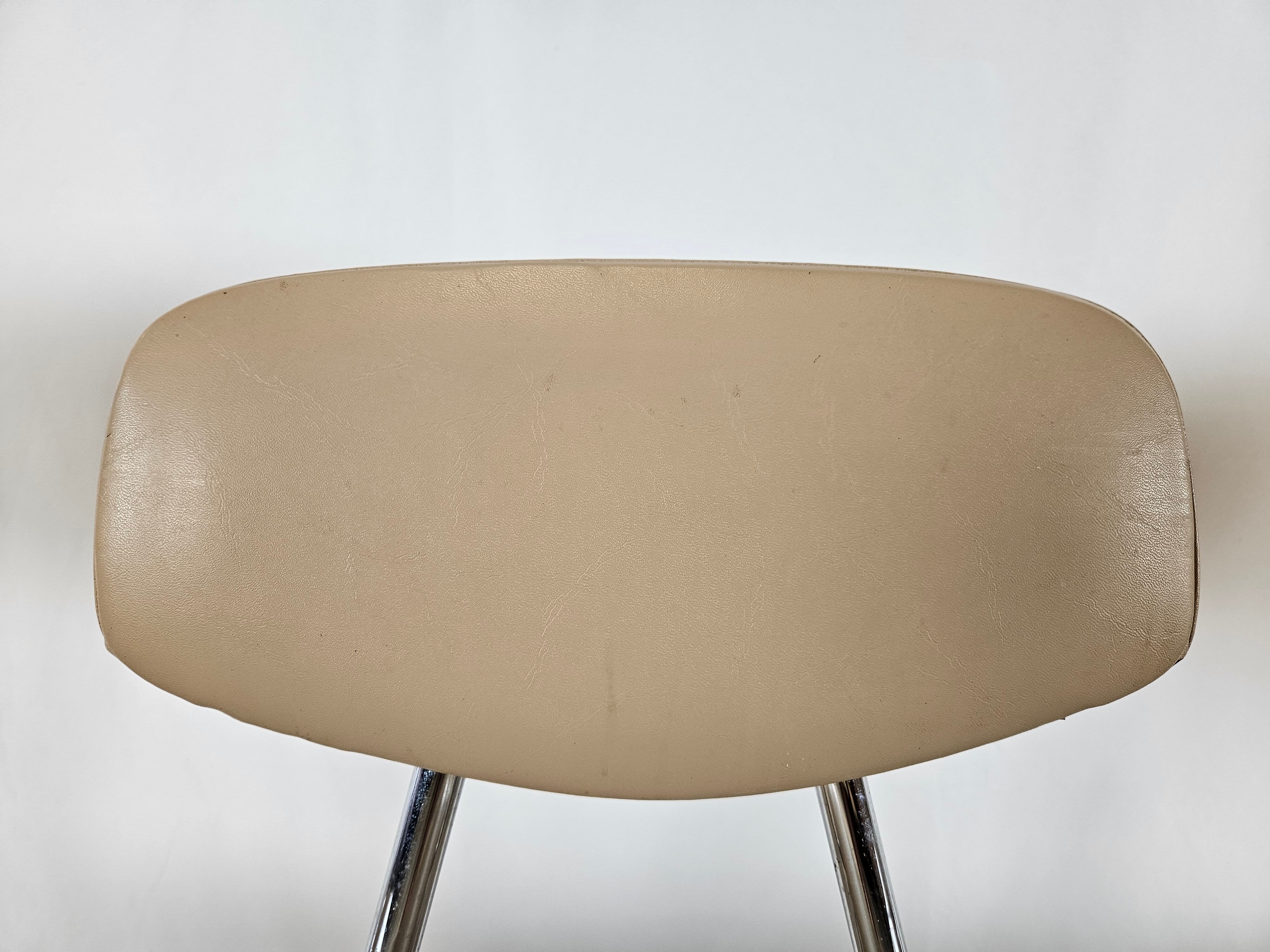 Set of four chairs in iron and skai 1970