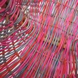 Small multi-colored wicker basket for children