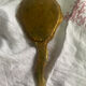 Patinated wooden Florentine hand mirror