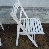 Set of folding chairs made of white patinated garden wood