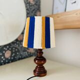 Vintage lamp with turned wooden base, striped wool lampshade