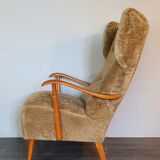 Norwegian sheepskin wing armchair with ottoman 1950