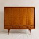 Vintage 4-door chevron wood wardrobe with mirror and gold legs.