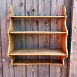 Artisanal shelf in raw wood