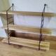 Pretty String shelf in very good condition.