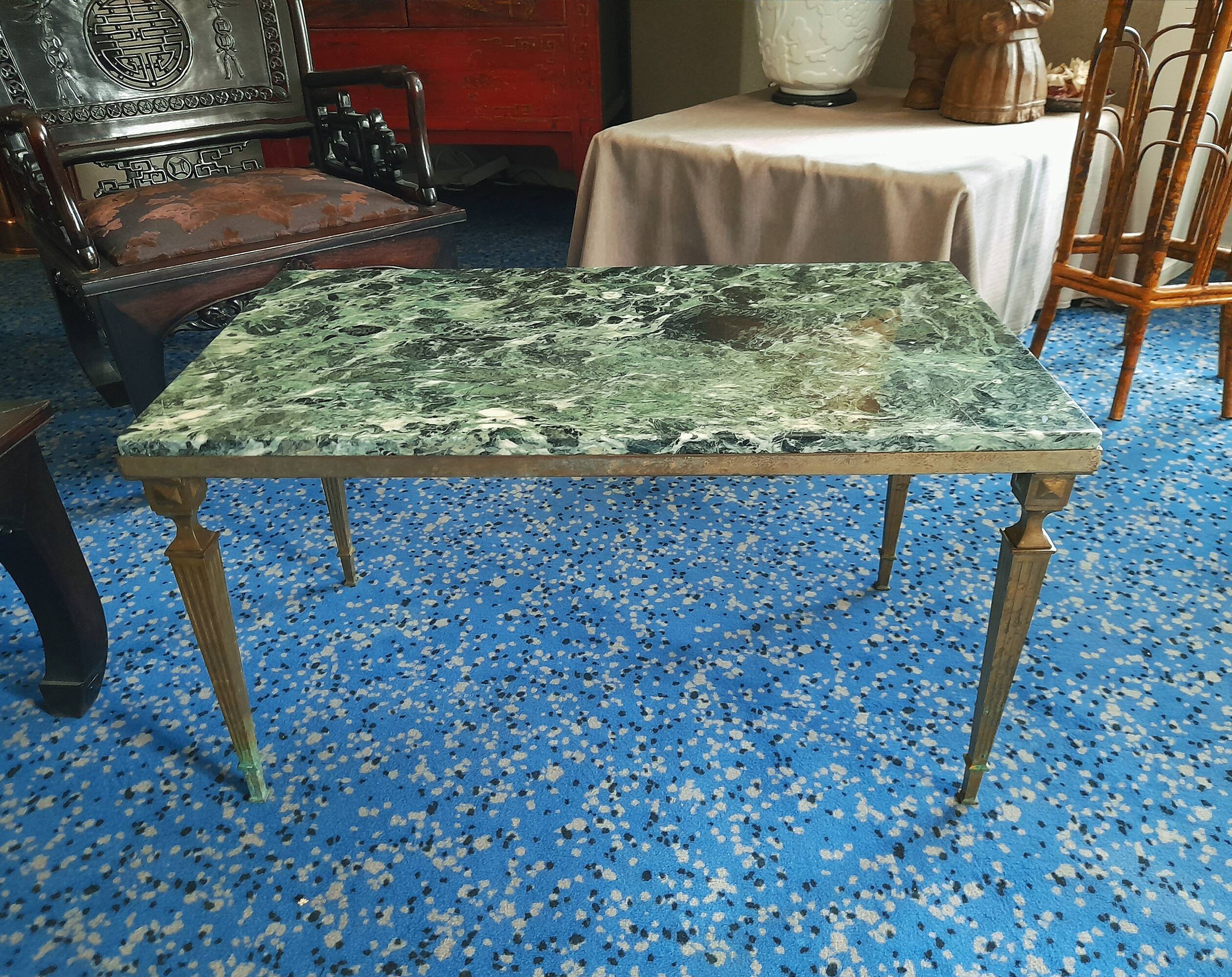 Coffee table in gilded bronze and green Alpine marble