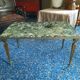 Coffee table in gilded bronze and green Alpine marble