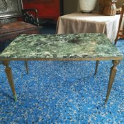 Coffee table in gilded bronze and green Alpine marble