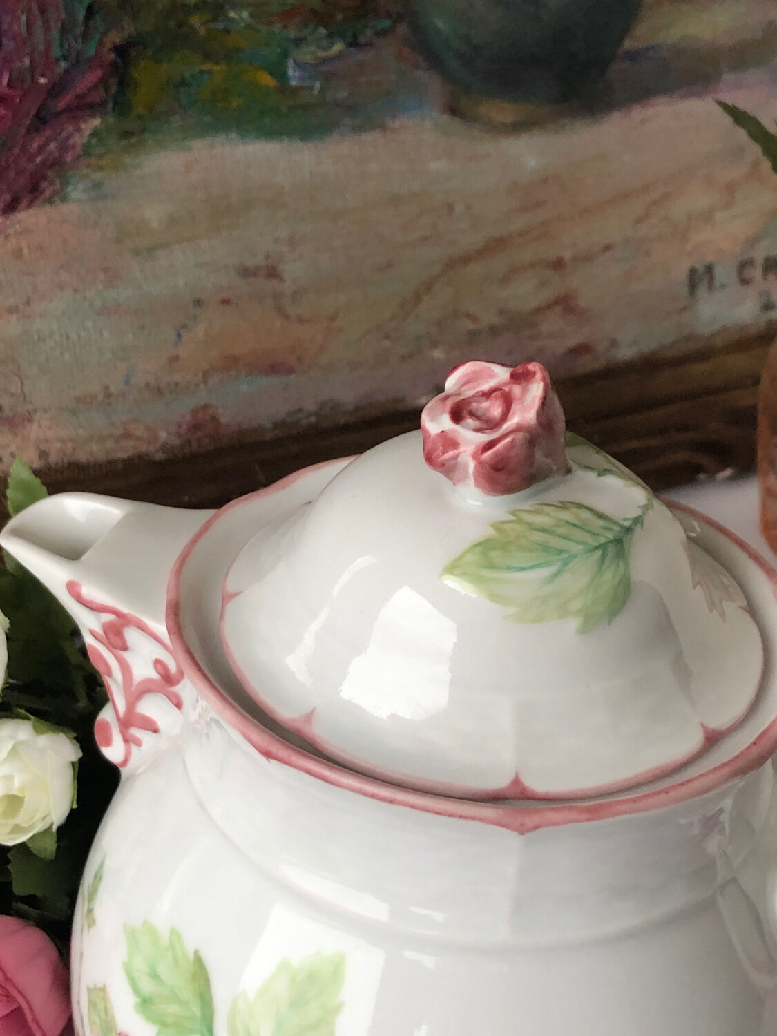 Old white and pink teapot