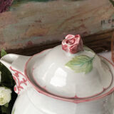 Old white and pink teapot