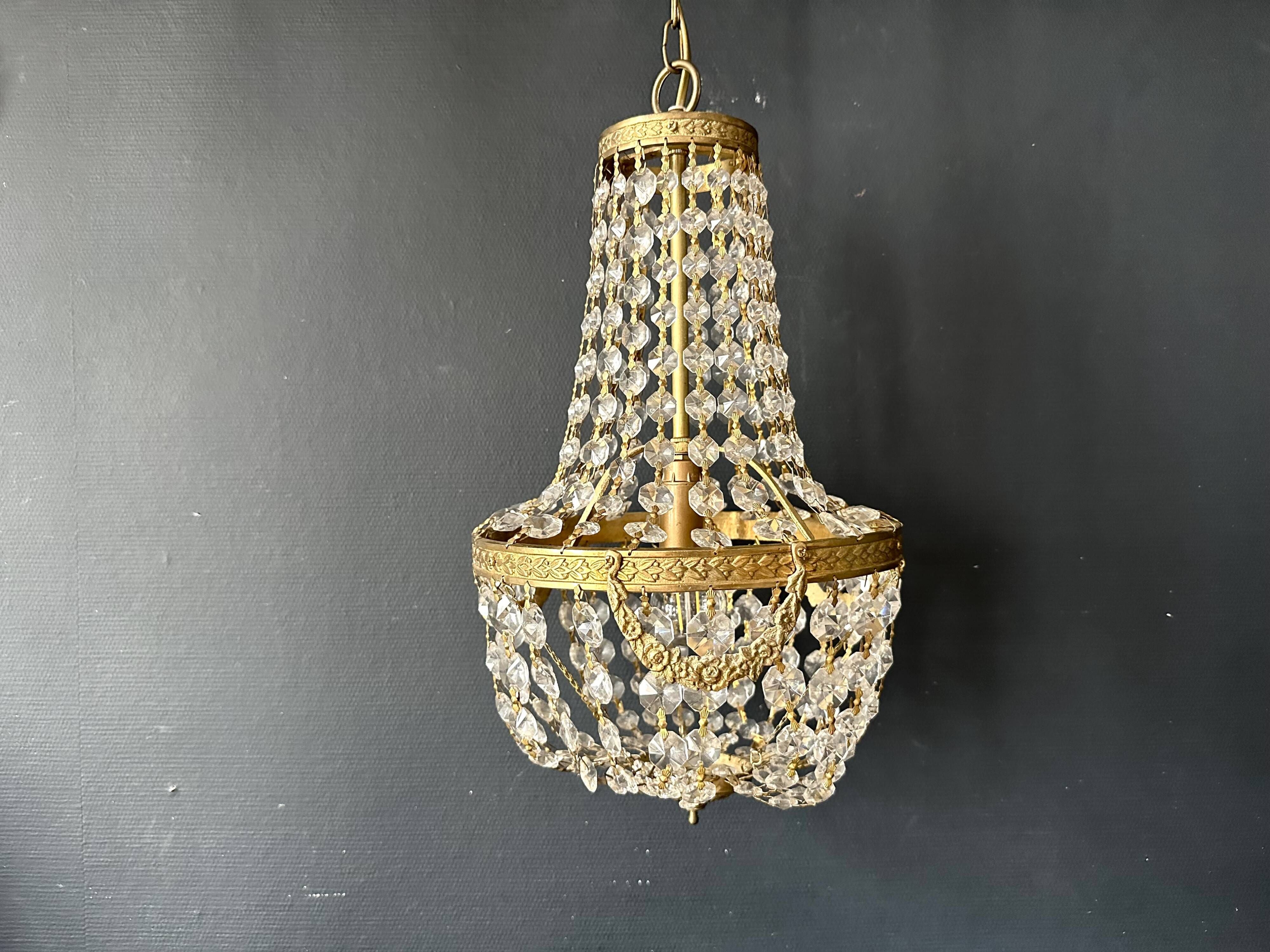 Golden bronze hot air balloon chandelier with glass pendants, mid-20th century.