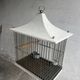 Vintage pagoda-style birdcage on a stand