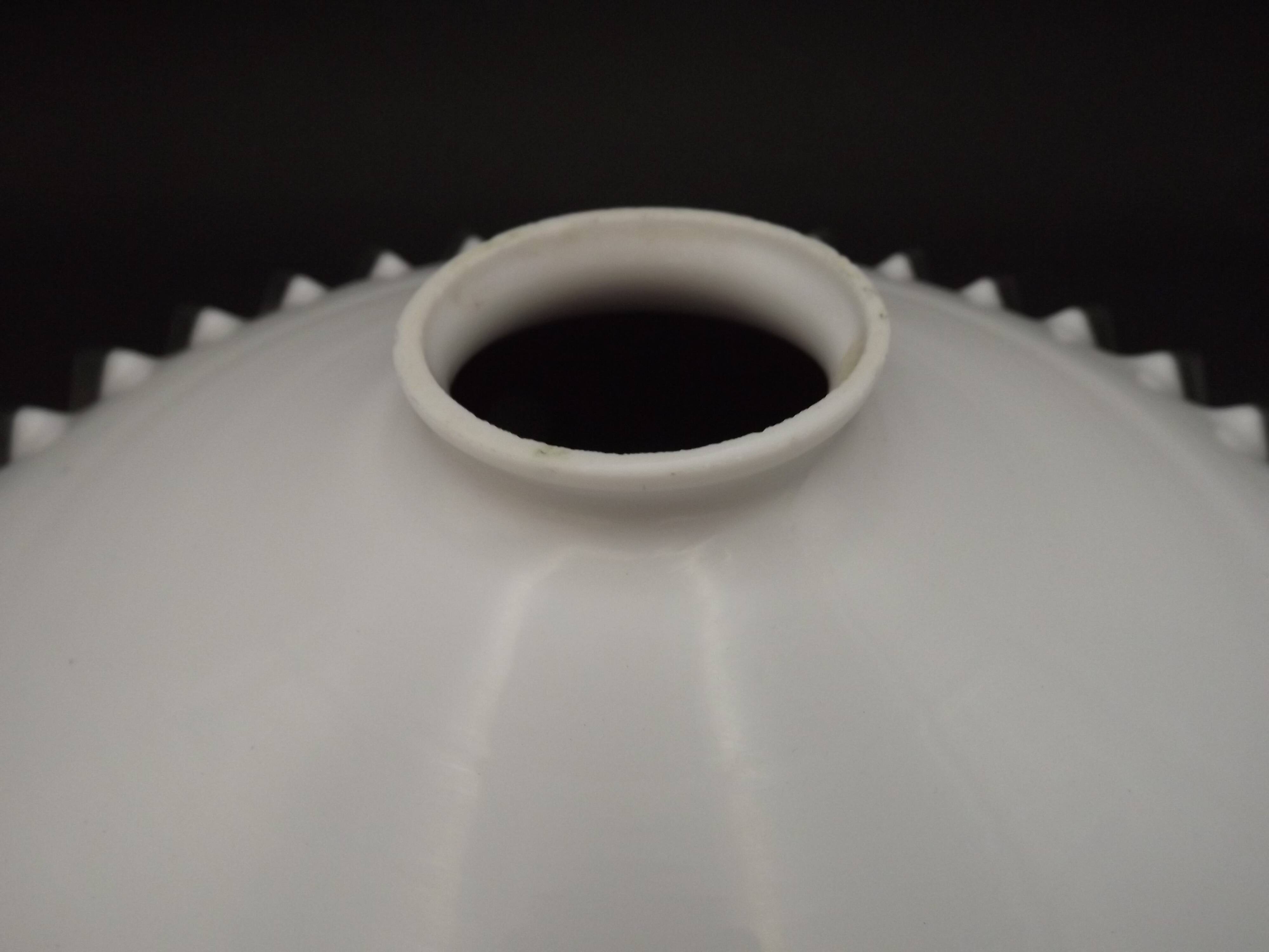 Fringed opal white glass pendant lampshade with scalloped edge.