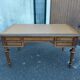 Double-sided flat desk in Louis XVI style made of mahogany and leather.