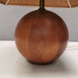 Very rare table lamp in turned teak wood with original braided shade. 1970s