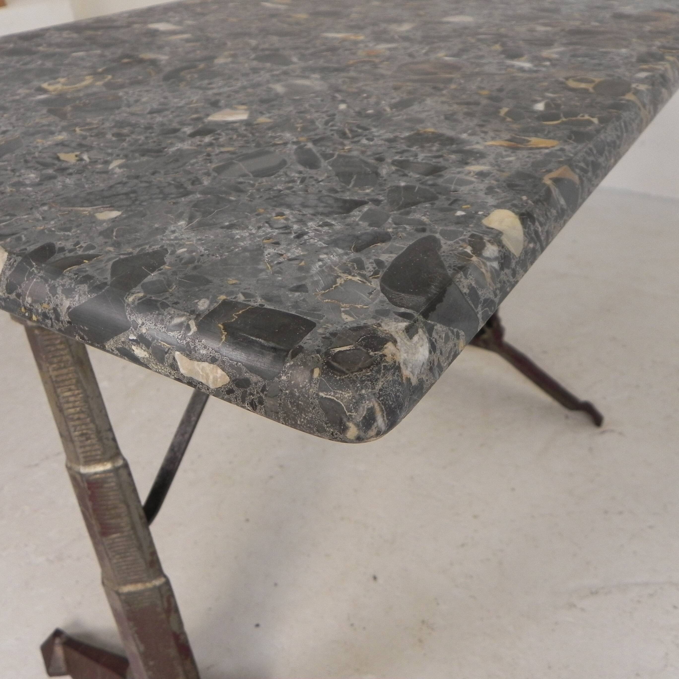 Bistro table with a marble top on a cast iron frame, 1930s.